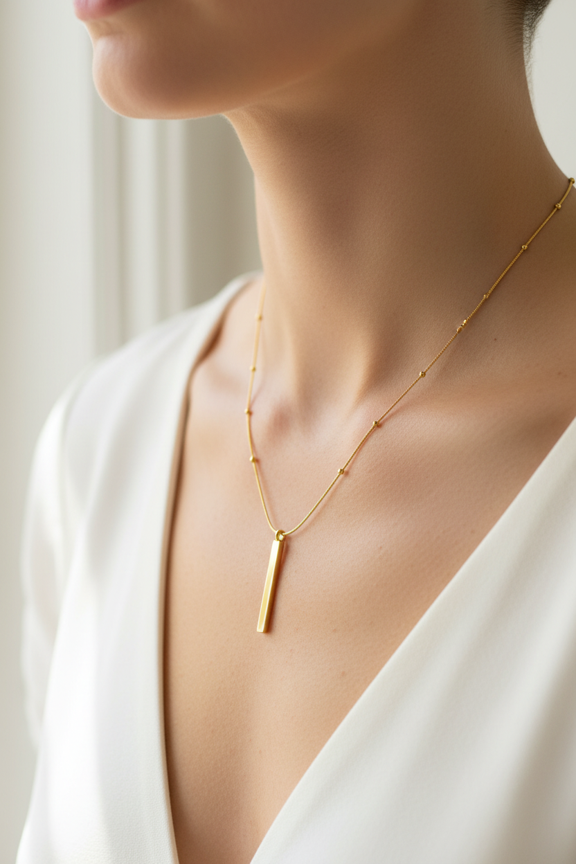 Model wearing Sleek Bar Mother-of-Pearl Pendant on neck and collarbone