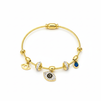 Gold Evil Eye Charm Bangle - White Background Flat Lay