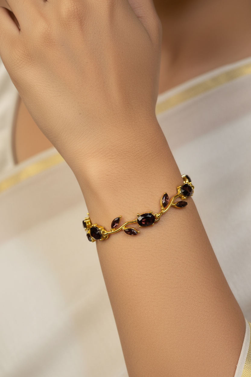 Model wearing Garnet Tulip Bracelet — editorial lifestyle shot