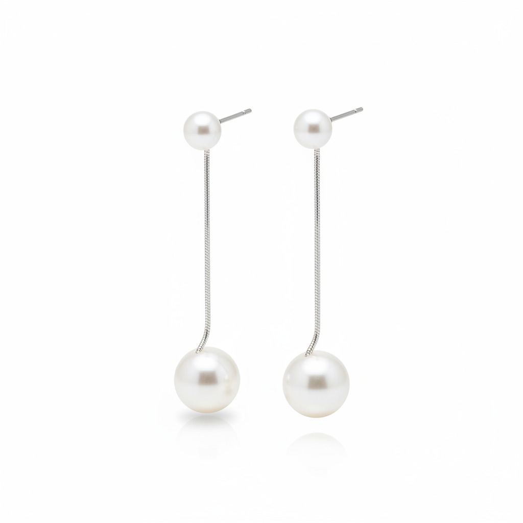 Pearl Drop Earrings - White Background Angled